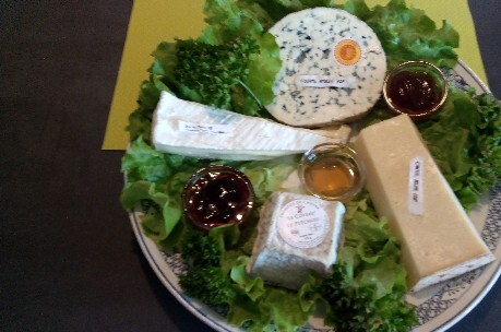 Various types of cheese including goat cheese and local cheeses